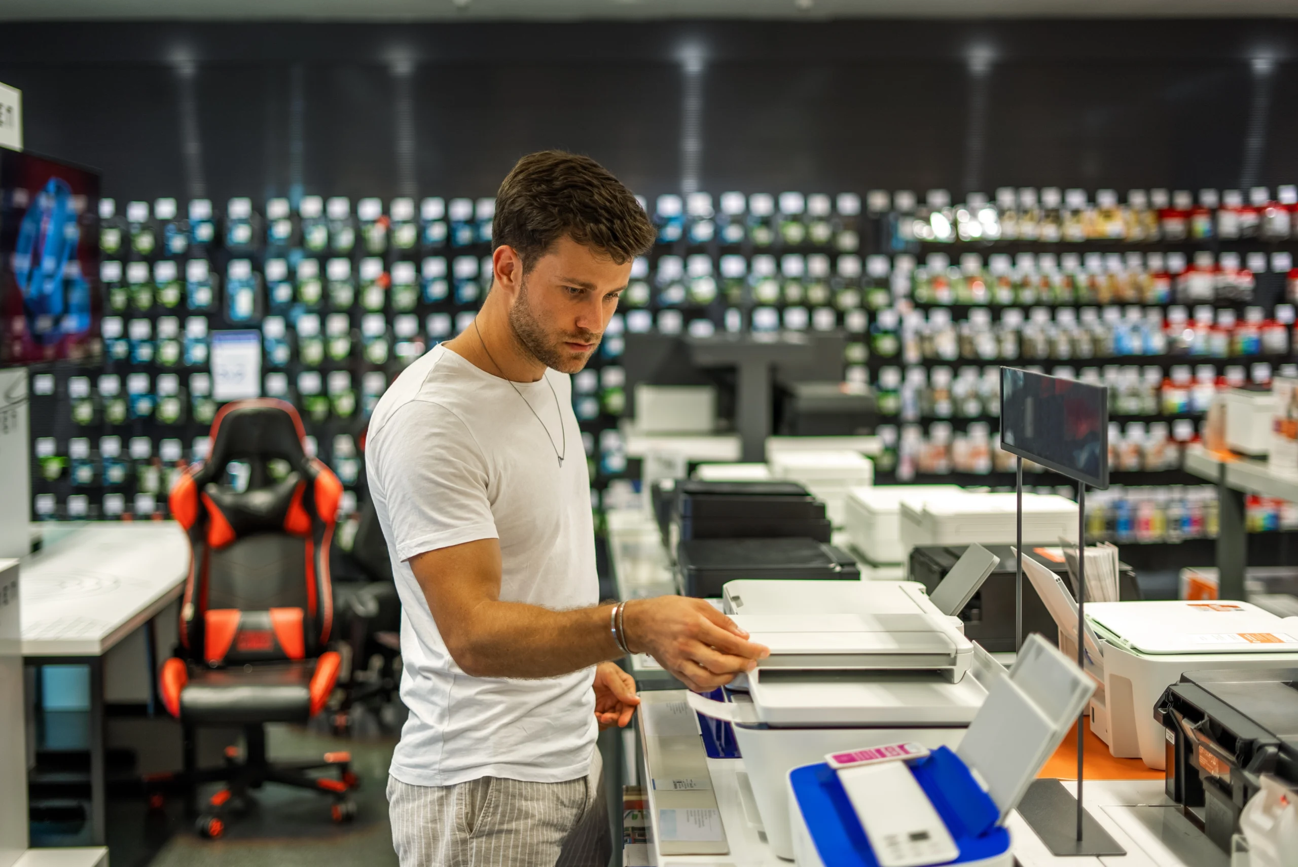 man-choosing-printer-in-store-2025-02-14-17-33-30-utc